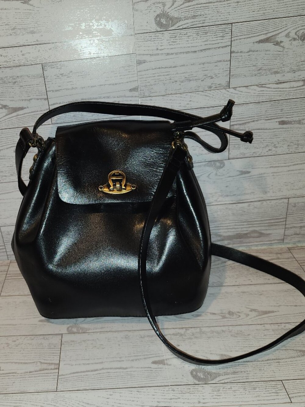 Etienne Aigner Black Leather Drawstring Backpack Gold Turn Lock Cowhide